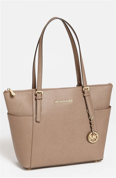 is luggage the same color as dark khaki michael kors|michael kors luggage bag.